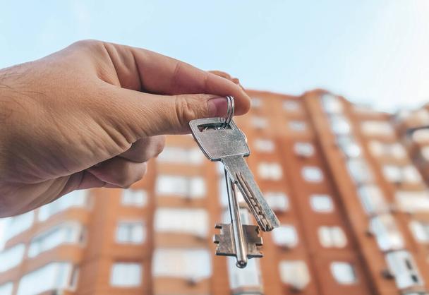 Keys to a new apartment in a new building.
